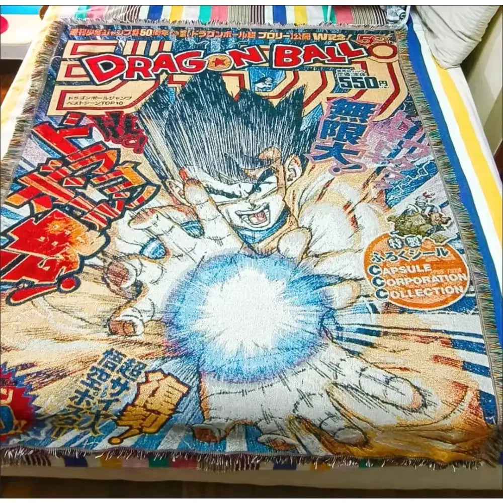 A vibrant dragon ball one piece textile blanket with cotton thread featuring goku unleashing kamehameha attack