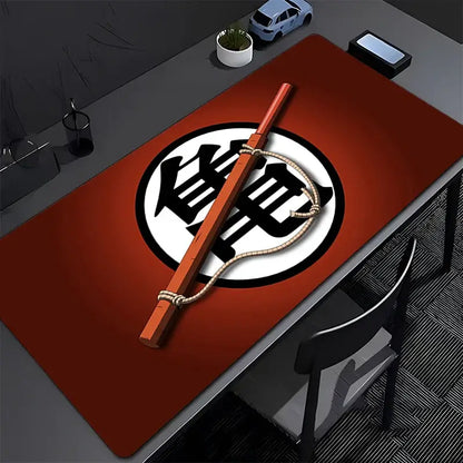 Red dragon ball z goku gaming mouse pad with cloth surface features a black and white circular logo and orange wooden staff