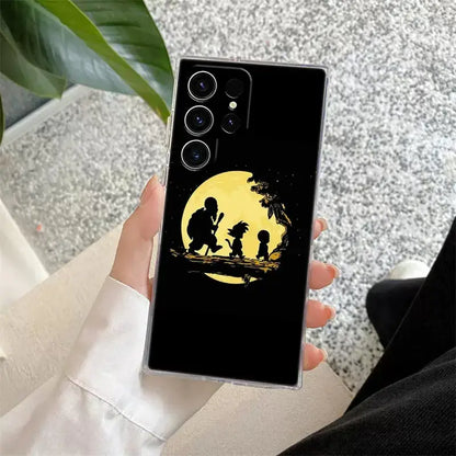 Black samsung ultra phone case with transparent border featuring dragon ball z goku silhouettes under yellow moon on back