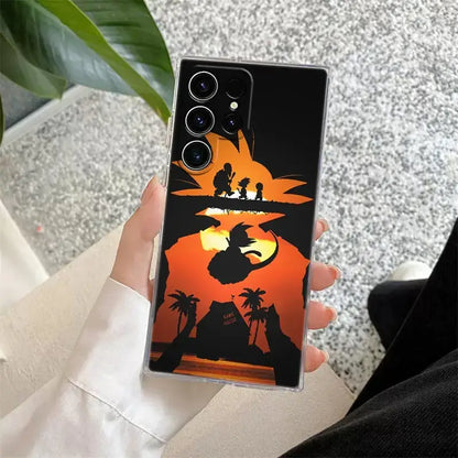 Back of clear samsung ultra phone case with black and orange dragon ball z goku silhouette against sunset background