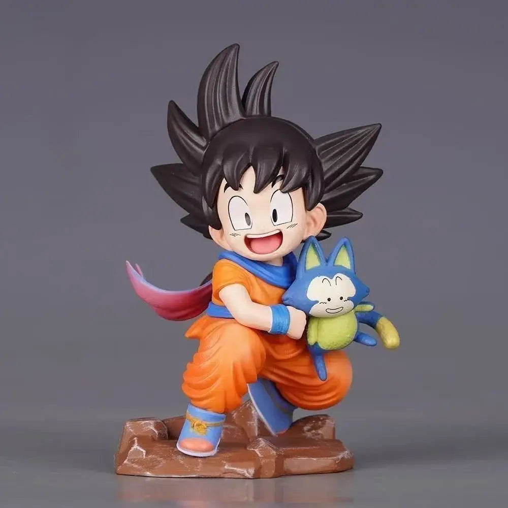 Dragon ball z goku pvc statue 10cm gk figure featuring a cheerful durable pvc goku in orange gi holding puar plushie