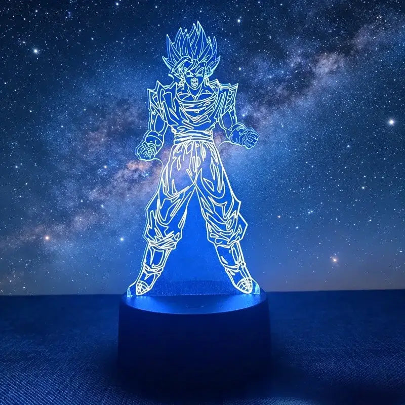 Blue-lit 3d led desk lamp featuring glowing outline of goku in super saiyan form from dragon ball goku vegeta design