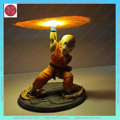 Dragon ball ball z krillin 3d led lamp featuring orange and yellow figurine holding glowing energy disc above head