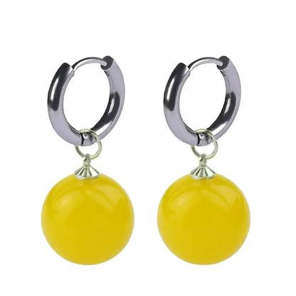 Bright yellow spherical dragon ball z potara earrings with silver-toned hoop hooks cosplay accessory