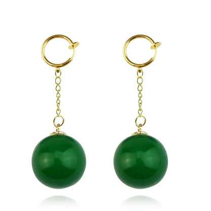 Golden hoop ball z potara earrings with dangling green jade spheres on delicate chains cosplay accessory