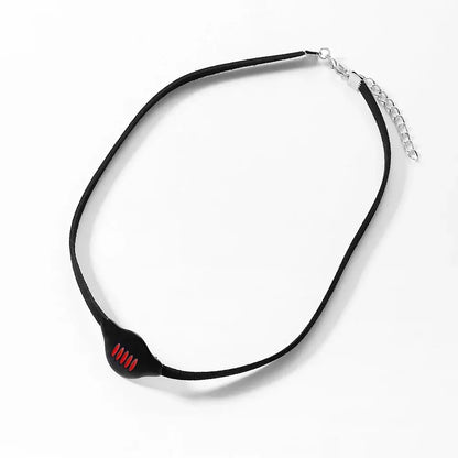 Dragon black choker necklace with black band and central pendant featuring red tooth like details