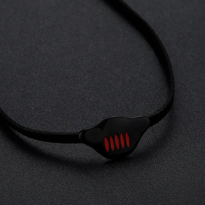 Dragon black choker necklace with glossy black oval pendant featuring three vertical red stripes