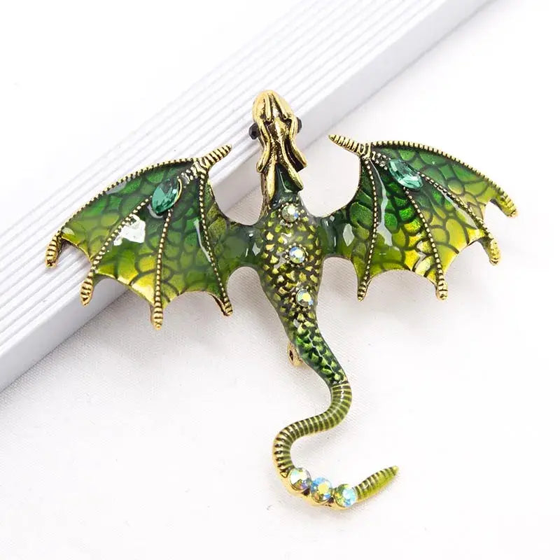 Green and gold dragon colorful metal brooch with enamel scales turquoise eyes and rhinestone accents lapel pin