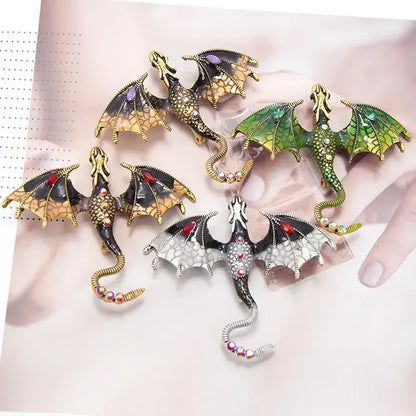 Set of five dragon colorful metal brooch lapel pins with ornate enamel wings in gold green black and silver with gemstones