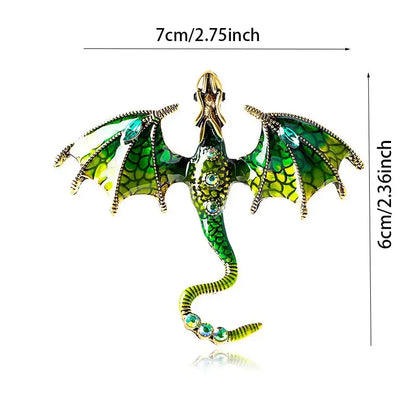 A vibrant green dragon colorful metal brooch lapel pin with gold accents and blue gemstones in enamel design