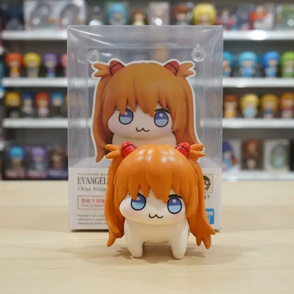 Orange-haired chibi-style evangelion asuka figure 5cm pvc desktop ornament with blue eyes and red horns in clear plastic packaging