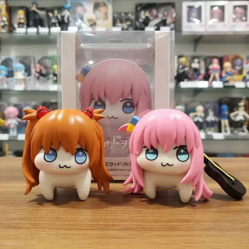 Two chibi-style evangelion asuka hitori figures with orange pigtails and pink hair 5cm pvc statue collectible
