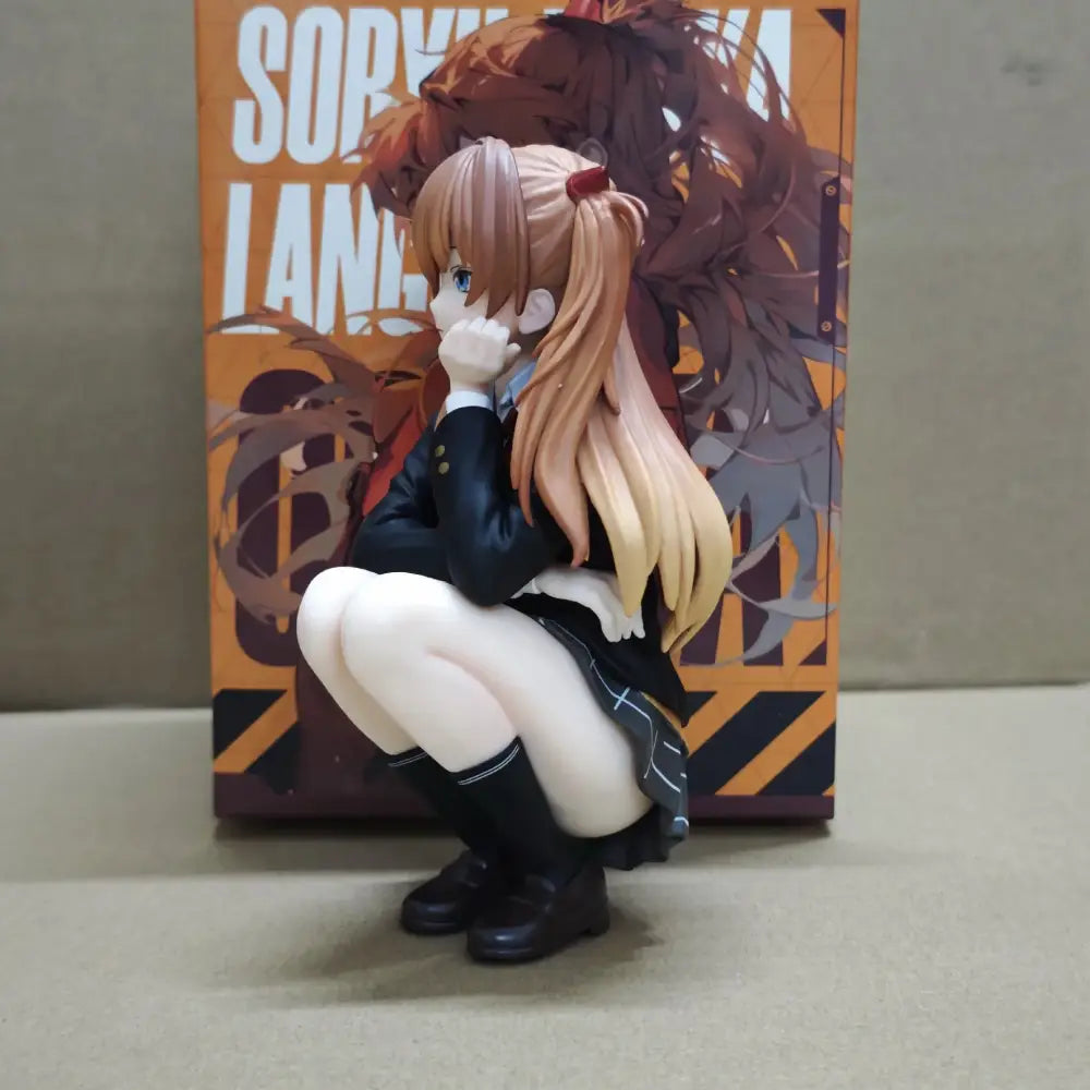 A detailed asuka langley soryu pvc figure with light brown pigtails wearing a black school jacket and white shorts