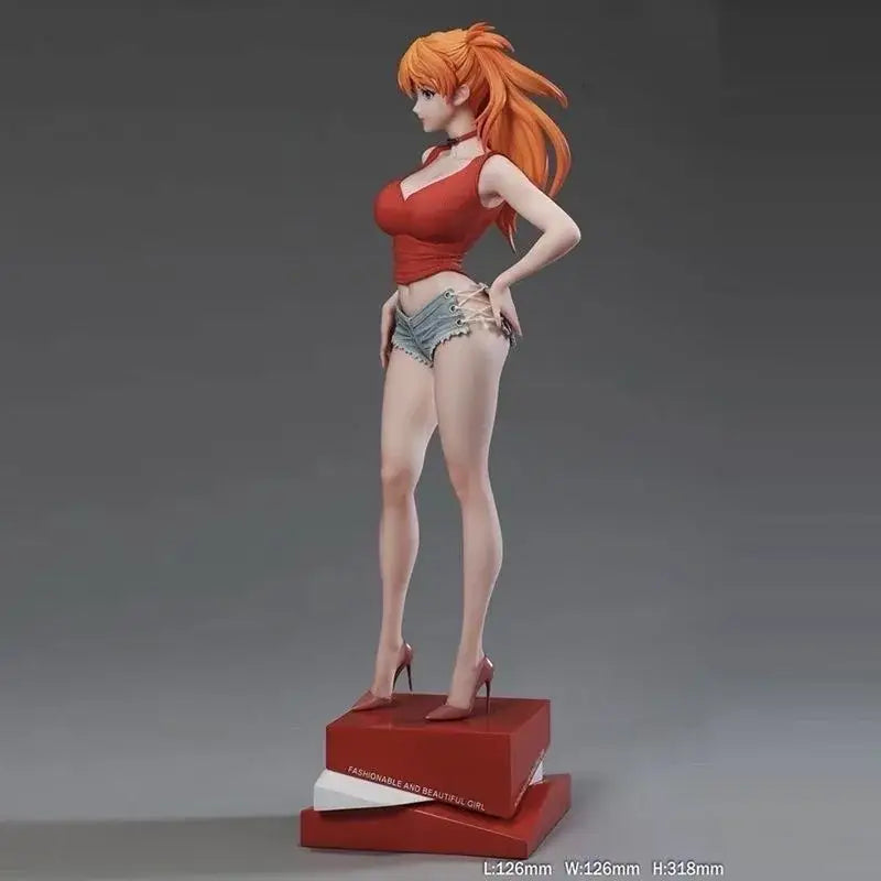 Orange-haired asuka langley soryu pvc statue in red top and denim shorts standing on a red base