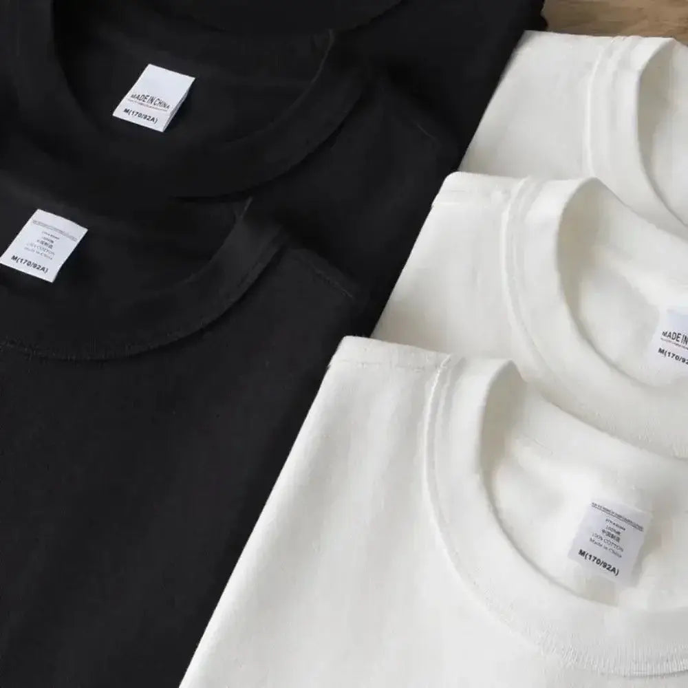 Black and white heavyweight cotton crew neck t-shirts with vintage wash and minimalist labels from evangelion asuka collection