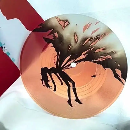 Translucent orange vinyl record featuring black silhouette winged figure with shards radiating for evangelion ayanami rei acrylic coaster