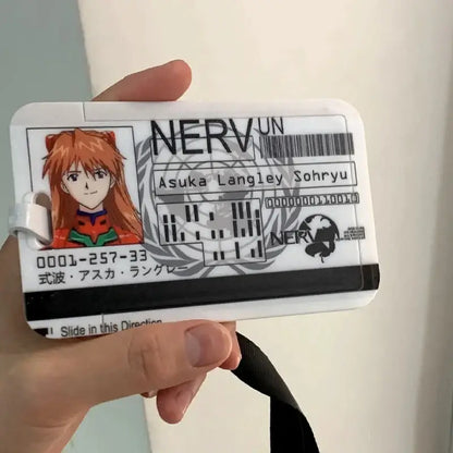 White plastic card holder featuring an evangelion ayanami rei card with orange hair and red green uniform details