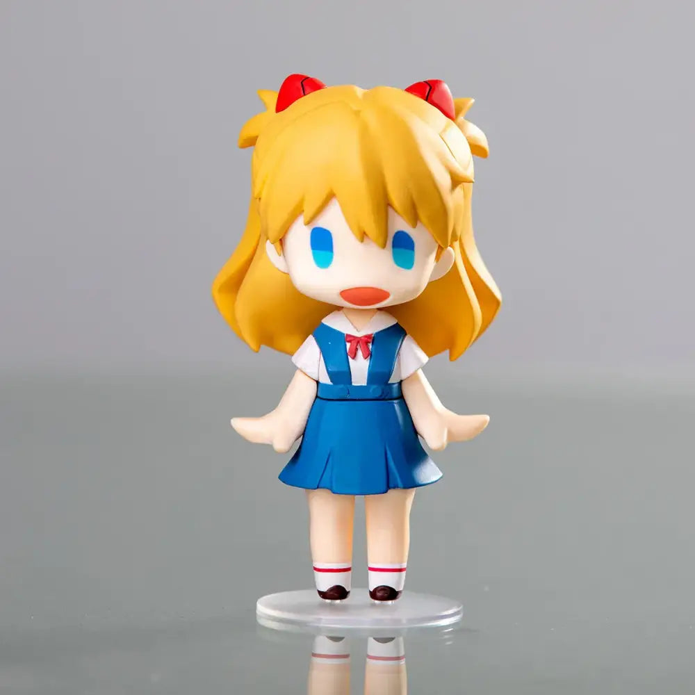 Chibi-style evangelion ayanami rei figurine with blonde hair and blue sailor uniform for kawaii car decor