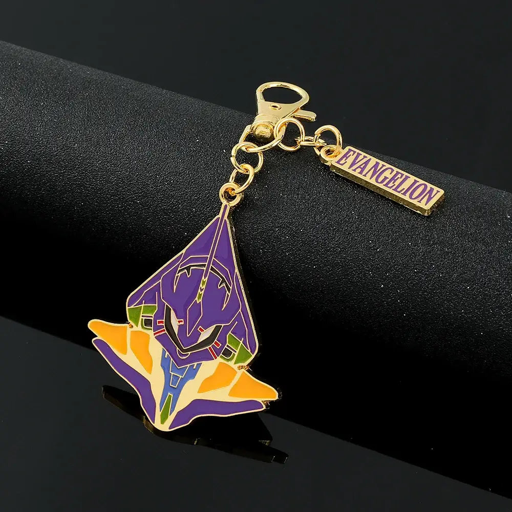 Gold-toned enamel metal pendant keychain featuring evangelion ayanami rei with purple orange and green colors and evangelion tag
