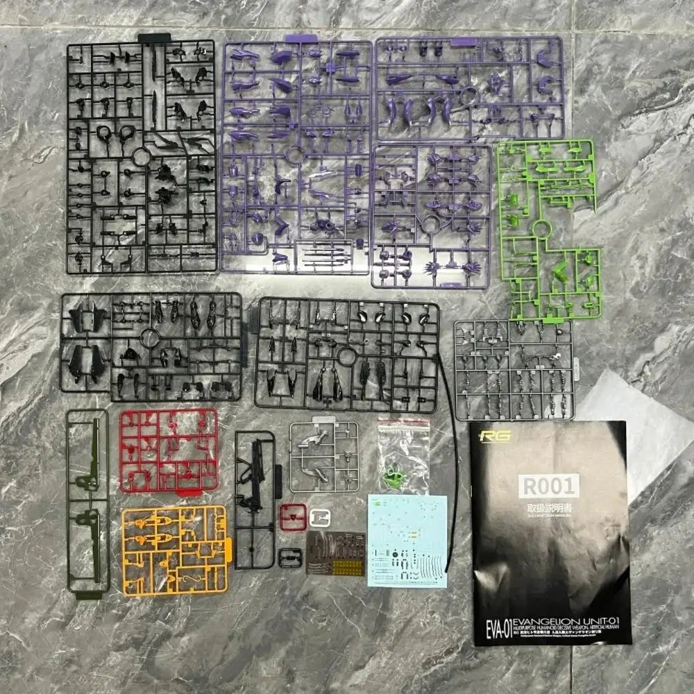Components of the r001 eva evangelion-01 1:144 scale plastic assembly kit laid out on a marble surface