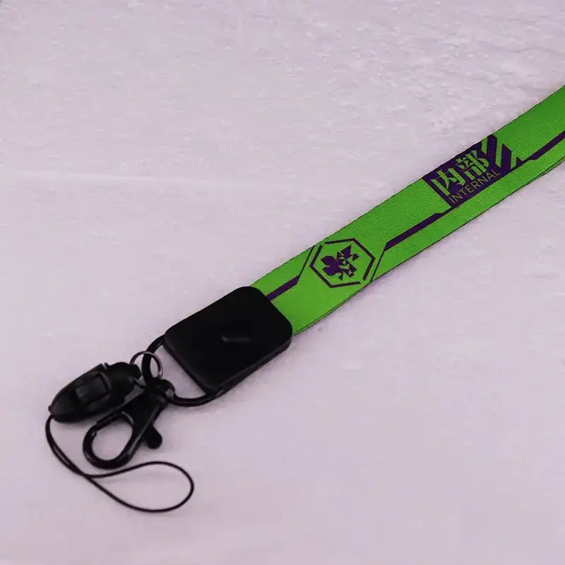 Bright green eva-01 inspired phone lanyard with black clip and purple internal logo neck strap 44cm long