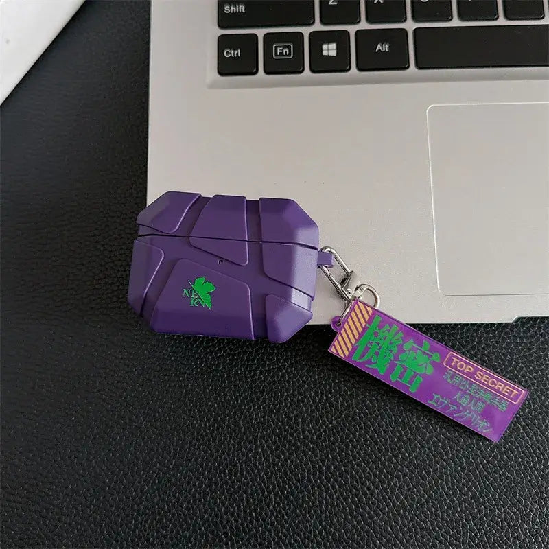 Purple silicone evangelion eva airpods case with green nerv logo and top secret keychain tag geometric design