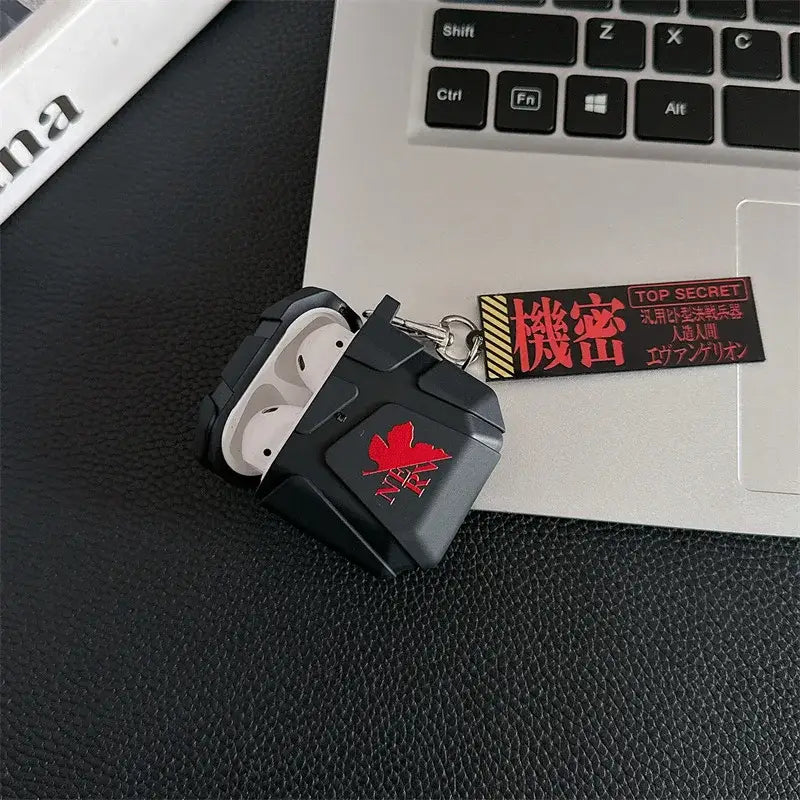 Black silicone evangelion eva airpods case with red maple leaf and x emblem keychain attachment