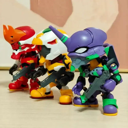 Three colorful chibi-style evangelion unit action figures in red white yellow and purple from a blind box assembly model kit