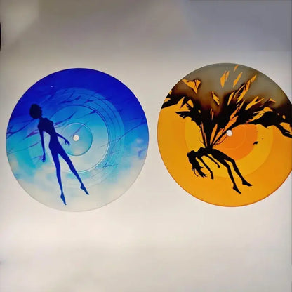 Two hand-painted evangelion rei acrylic coasters with blue and orange backgrounds perfect for desktop decor