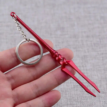 Red metallic evangelion spear of longinus keychain with silver ring and chain 12cm pendant in stylized trident shape