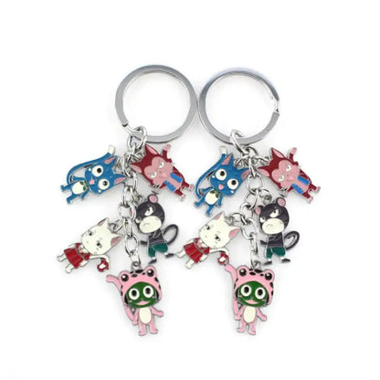 Two silver-toned metal fairy tail key rings with colorful enamel character charms for anime fans