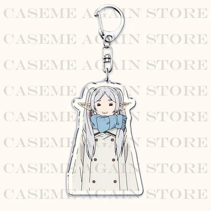Frieren beyond journey’s end acrylic keychain featuring silver elf with white hair blue scarf and white coat bag charm