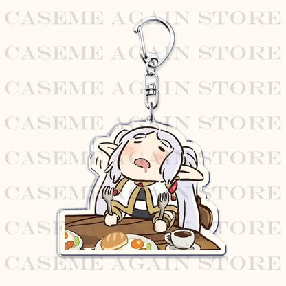 Clear acrylic keychain featuring cartoon elf with white hair eating at table, perfect frieren bag charm accessory