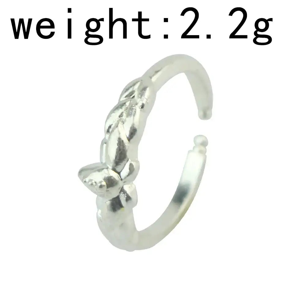 Silver braided knot ring with polished metallic finish made from zinc alloy in frieren frieren ring design