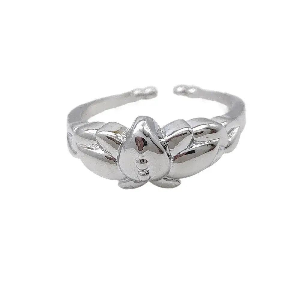 Silver lotus flower ring in zinc alloy with polished reflective finish and intricate petal detailing frieren frieren ring