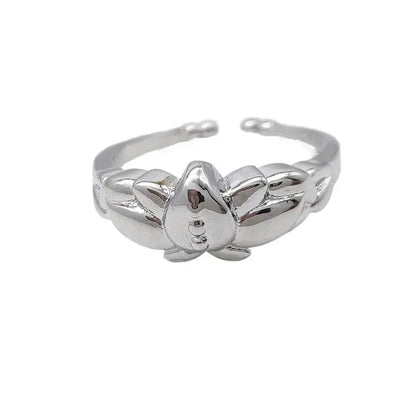 Silver lotus flower ring in zinc alloy with polished reflective finish and intricate petal detailing frieren frieren ring
