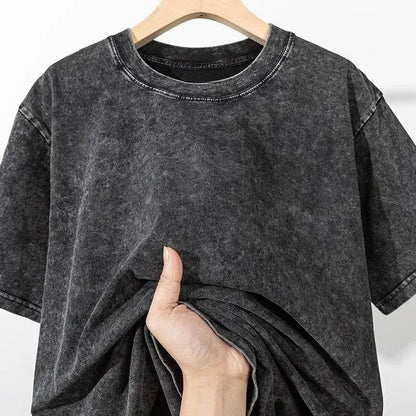 Frieren frieren washed t-shirt is a dark gray vintage washed graphic tee made of soft cotton with a ribbed crew neckline