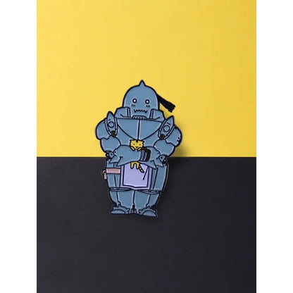 Blue metallic enamel alphonse elric enamel pin featuring the iron giant holding a yellow cat with an apron