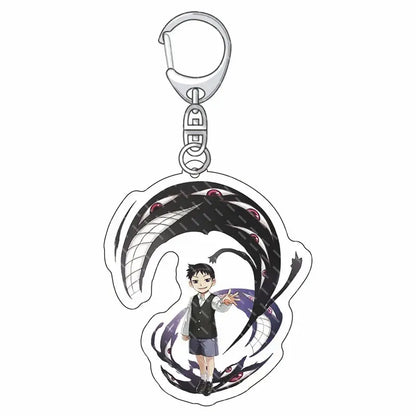 Clear acrylic edward elric acrylic keychain featuring anime character with black serpentine design and red eyes