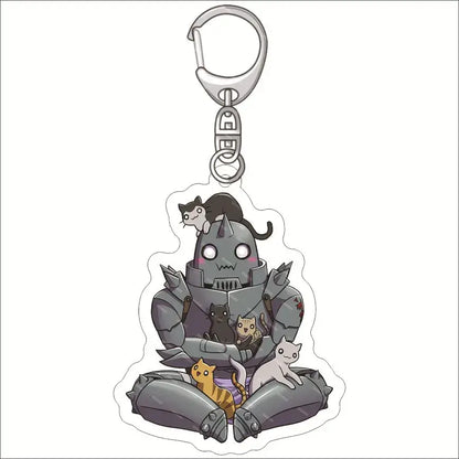 Silver metallic edward elric acrylic keychain with transparent charm featuring the iron giant and cartoon cats