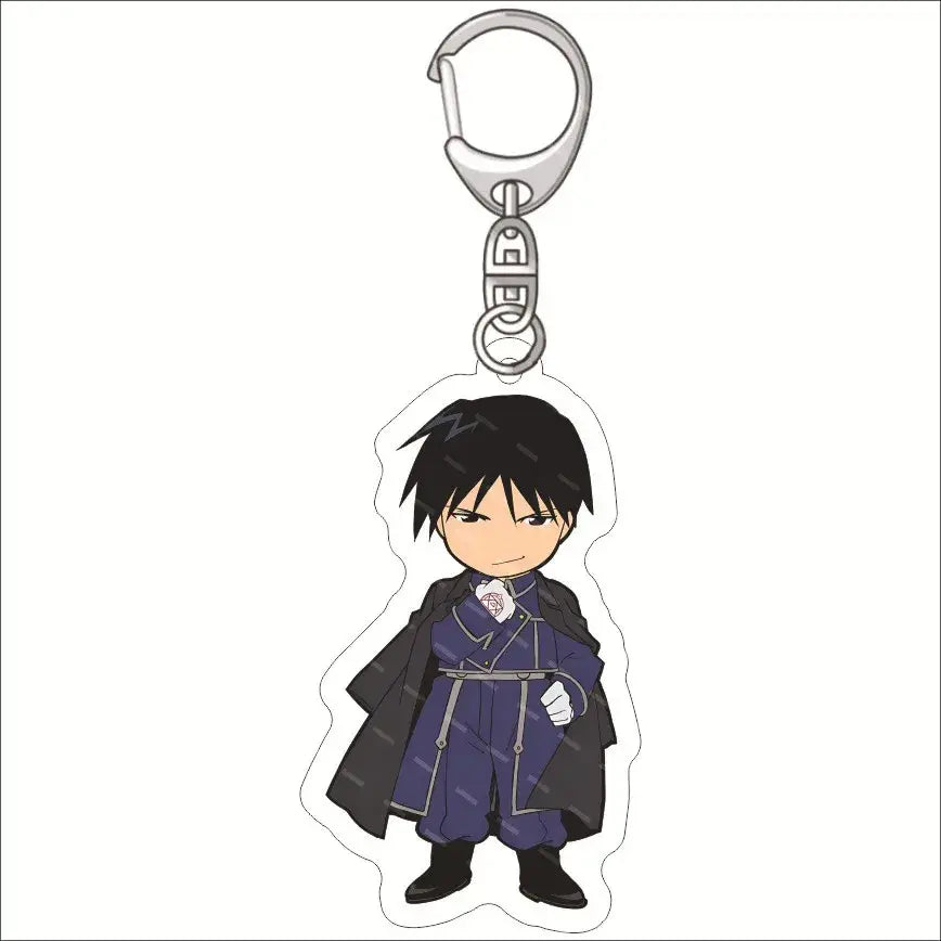 A clear acrylic edward elric acrylic keychain featuring a chibi anime character in a dark purple uniform and black cape