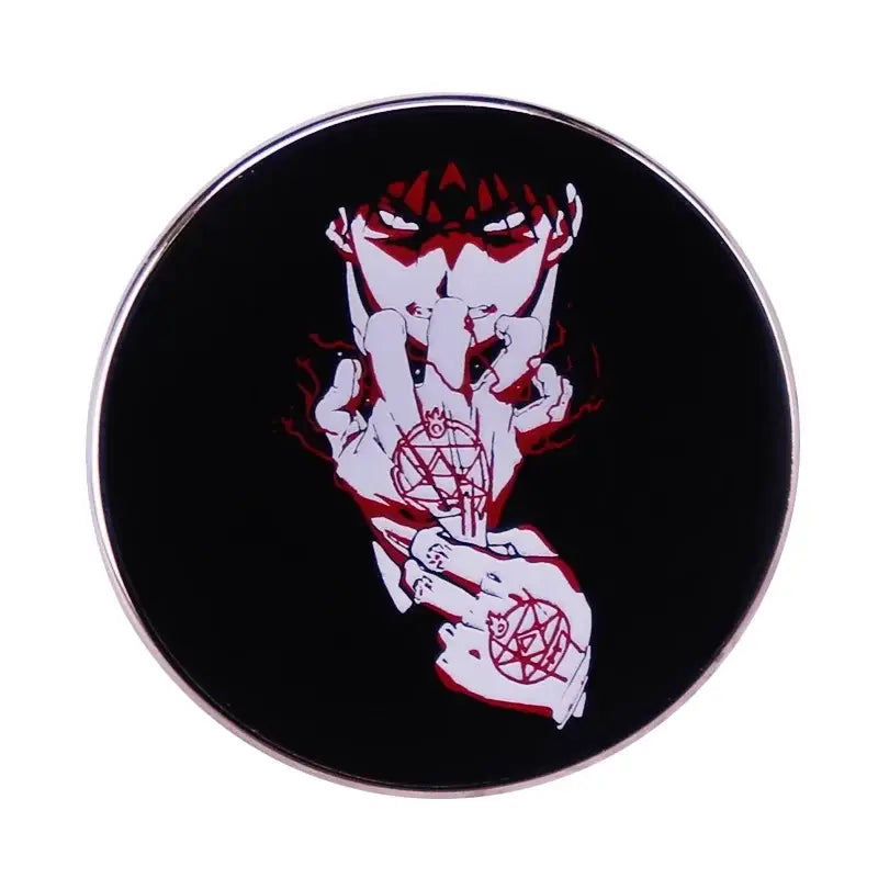 Black enamel edward elric enamel pin with silver border featuring anime character with pentagram tattoos in red and white