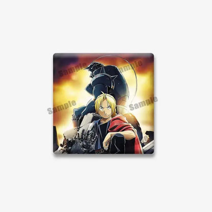 Square-shaped fullmetal alchemist lapel brooch featuring edward elric in armor with fiery orange yellow background