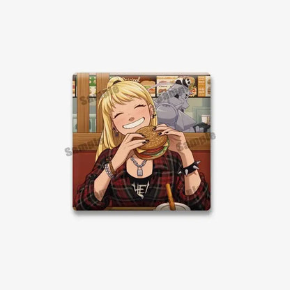 Fullmetal alchemist edward elric square lapel brooch featuring anime-style blonde girl in red and black plaid shirt eating burger
