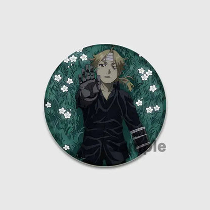 Fullmetal alchemist enamel brooch featuring a circular handmade badge of a blonde anime character in black outfit on grass