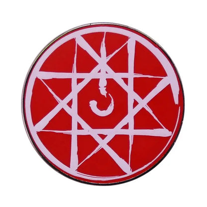 Fullmetal alchemist enamel pin featuring a red circular metal brooch badge with a white star and hook design