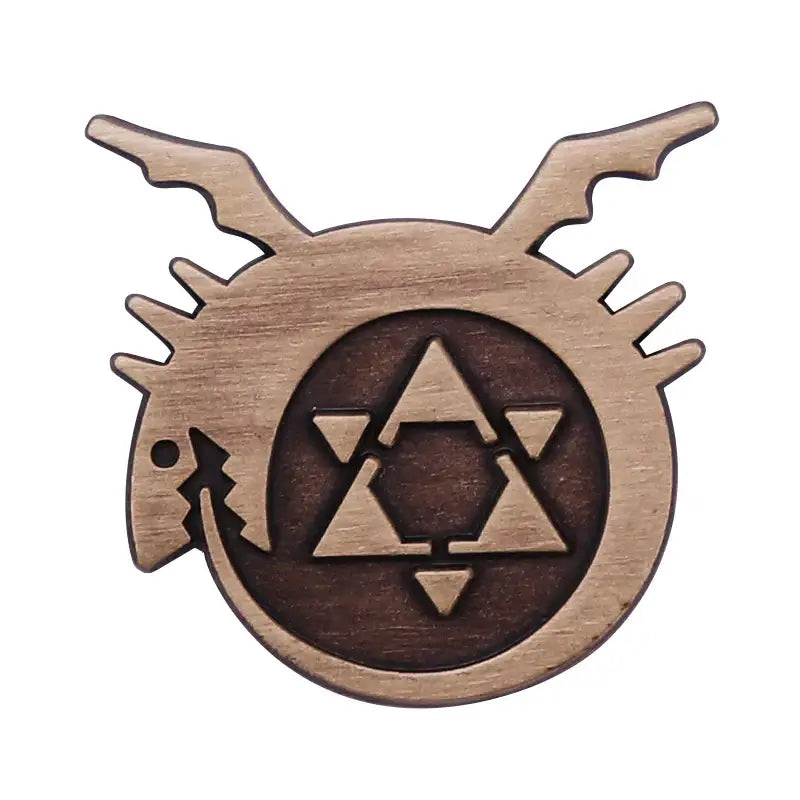 Wooden enamel pin metal badge featuring a stylized dragon head with intricate triangular patterns in a circular design