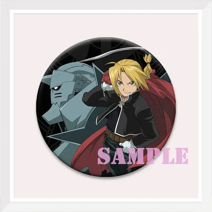 Circular enamel pin featuring roy mustang and a blonde anime character from fullmetal alchemist with red cape