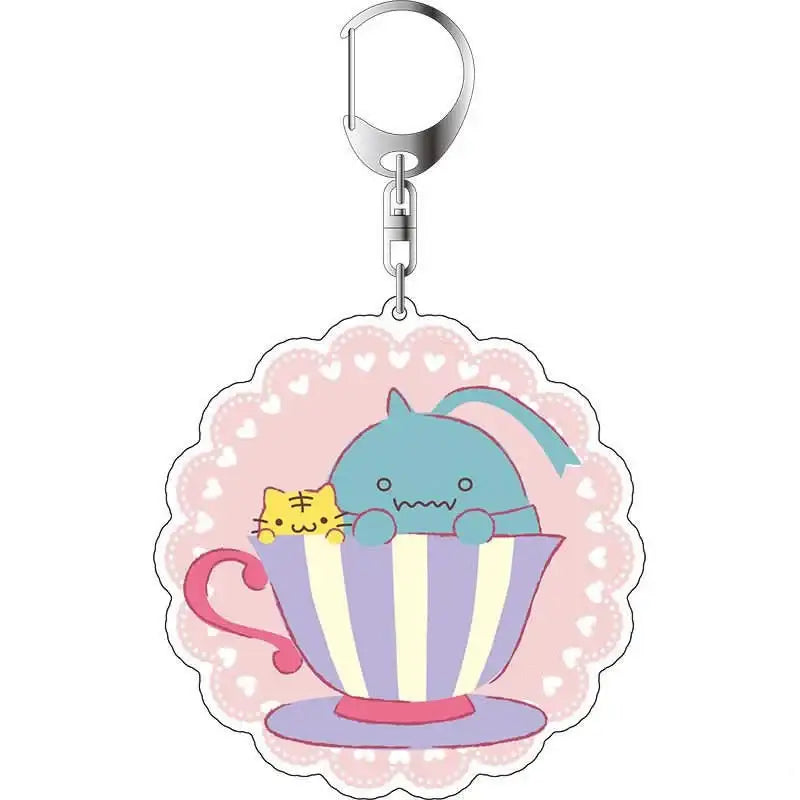Fullmetal alchemist winry rockbell acrylic keychain 6cm featuring pastel teacup with blue creature and yellow kitten