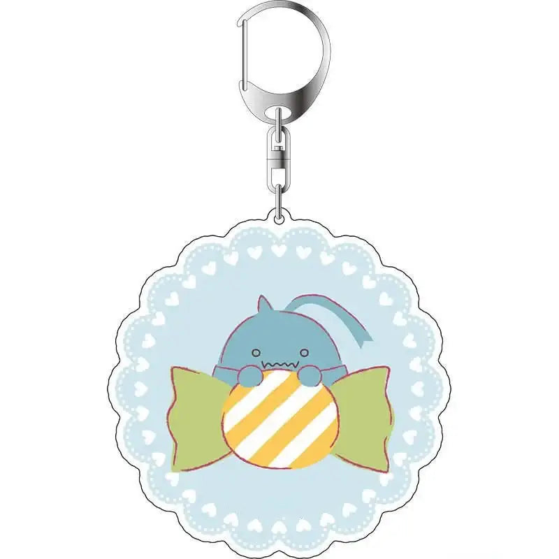 Fullmetal alchemist winry rockbell acrylic keychain featuring a cute blue cartoon shark with yellow candy design and green wings